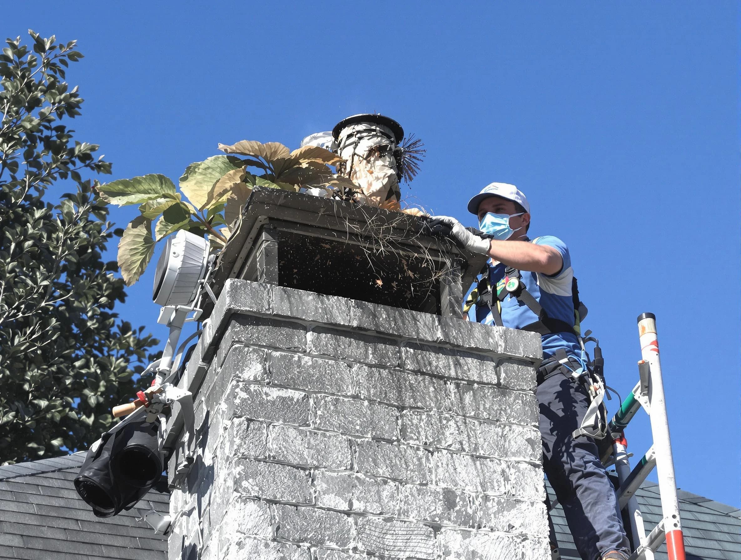 El Cerro Mission Chimney Sweep specialist performing chimney cleaning in El Cerro Mission, NM